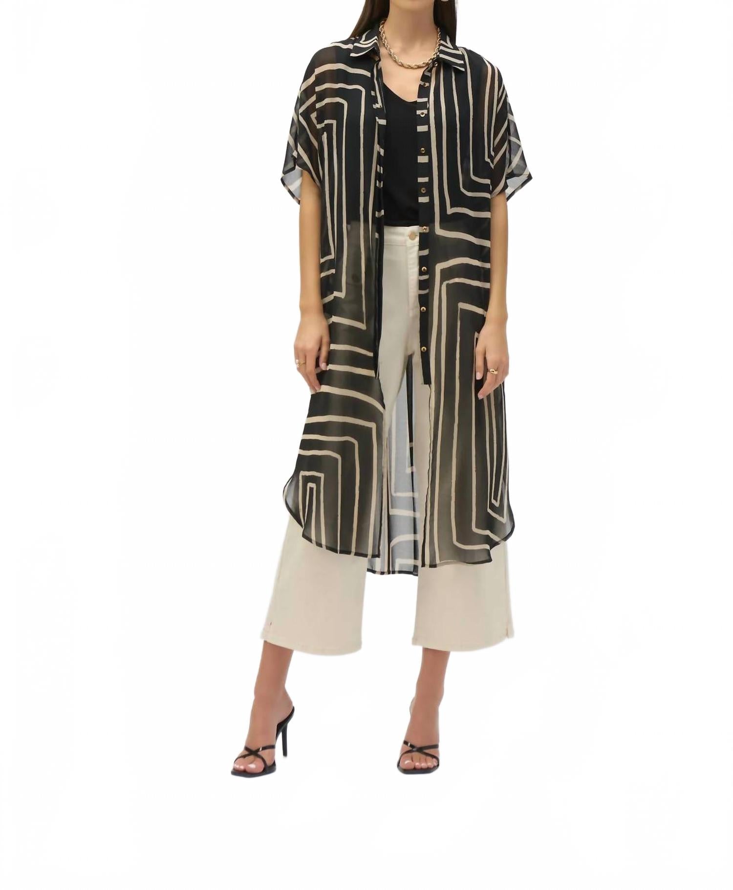 Blusa de gasa color negro y beige