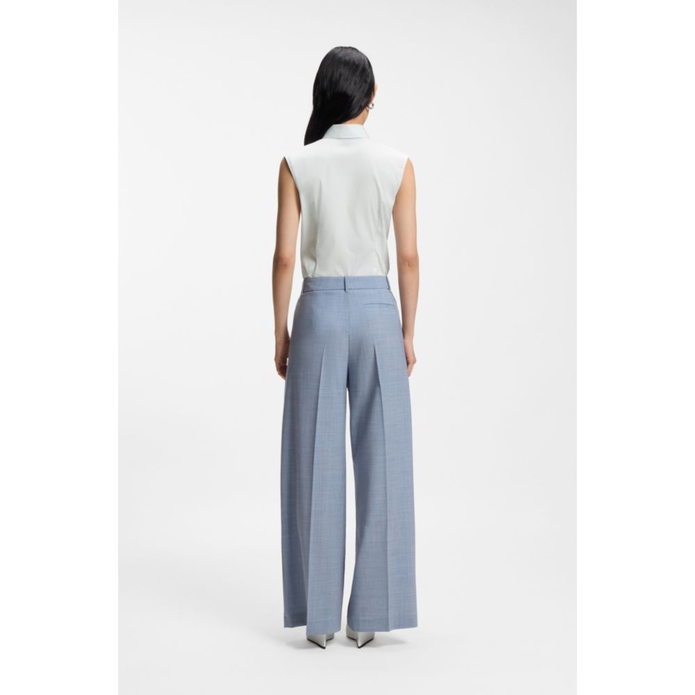 Blusa de mezcla de algodón sin mangas de corte ajustado