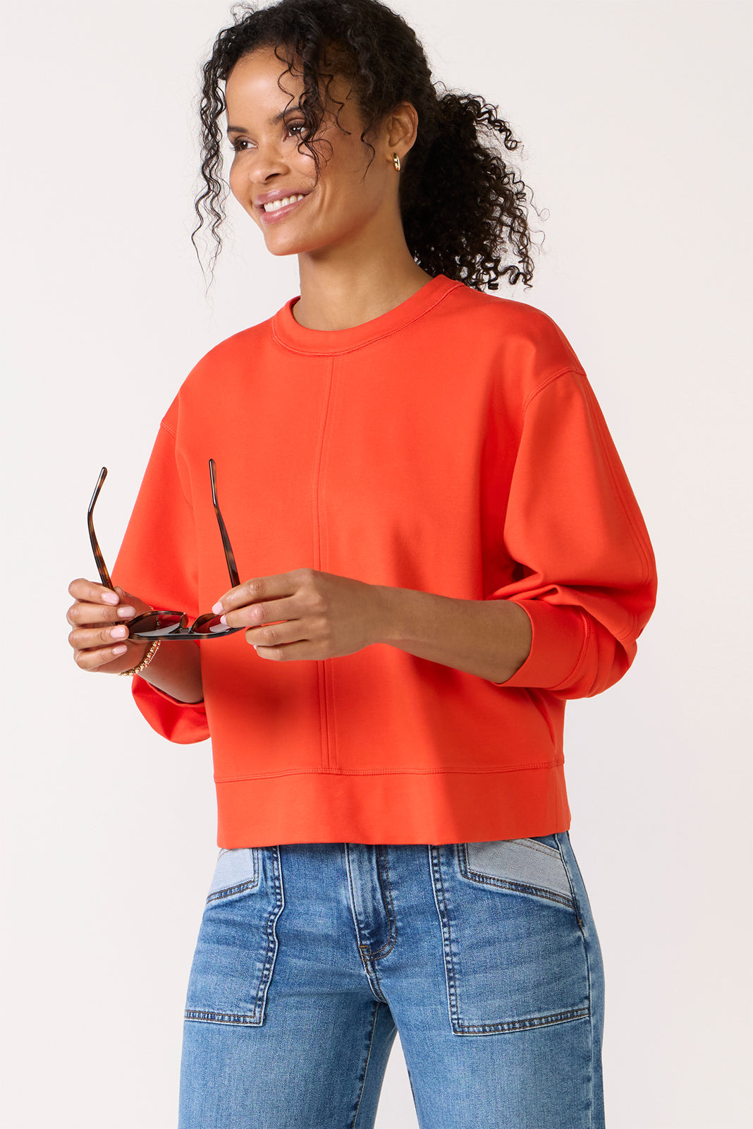 Top de mujer de manga larga con cuello redondo