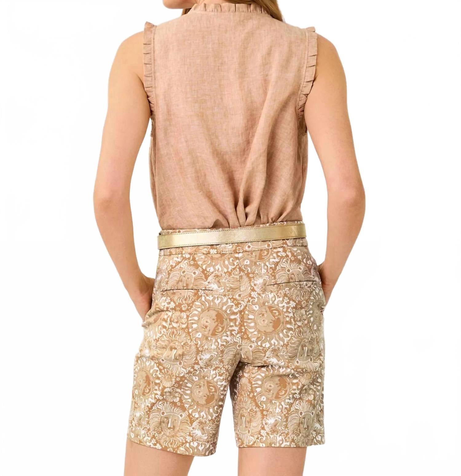 Top sin mangas con boleros color blanco