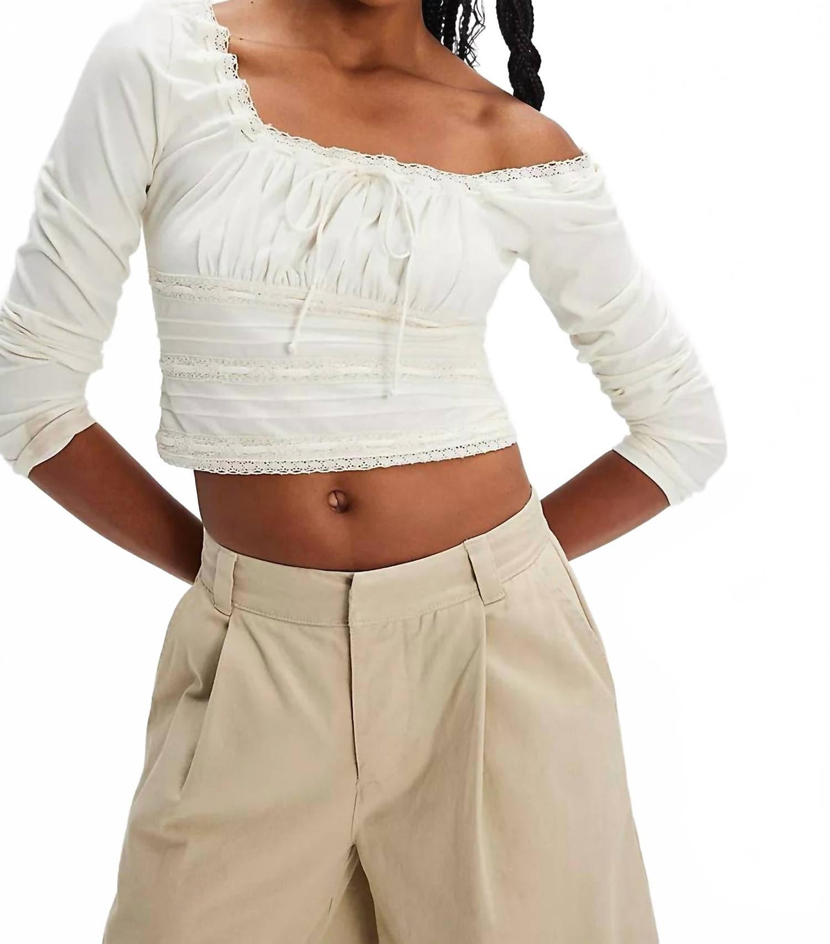 Top de manga larga color marfil