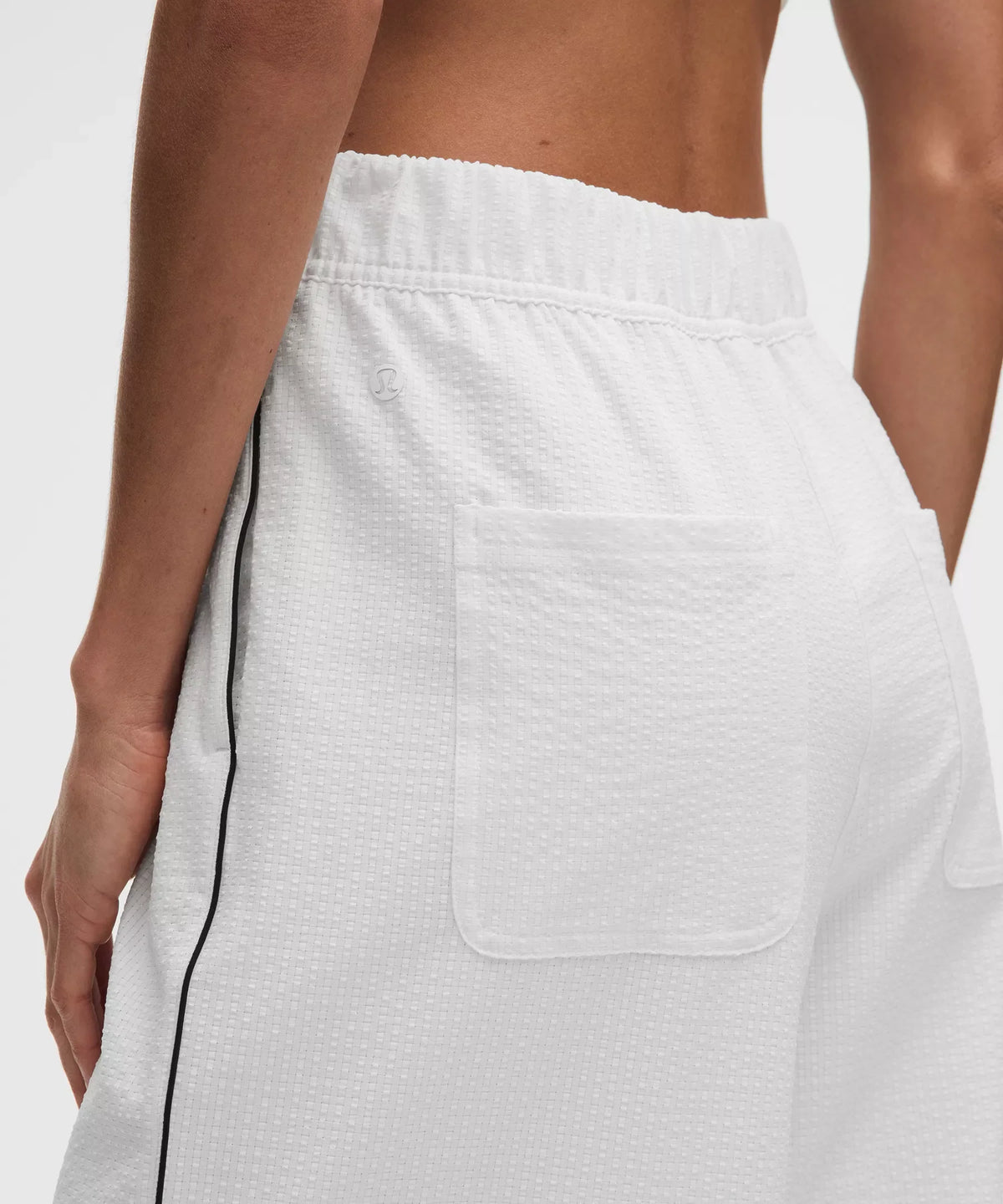 Pantalón de tiro alto con pliegues