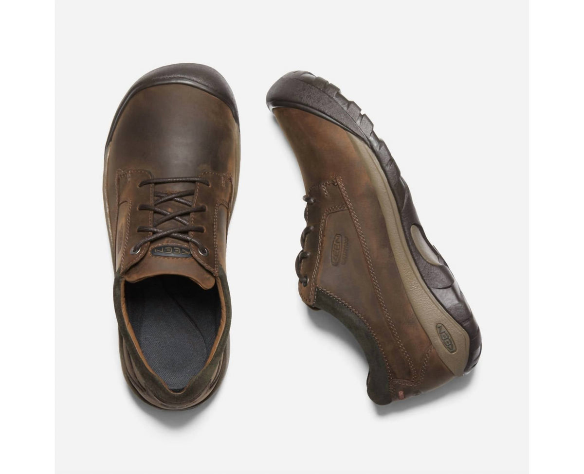 Zapatos de hombre impermeables color negro y café