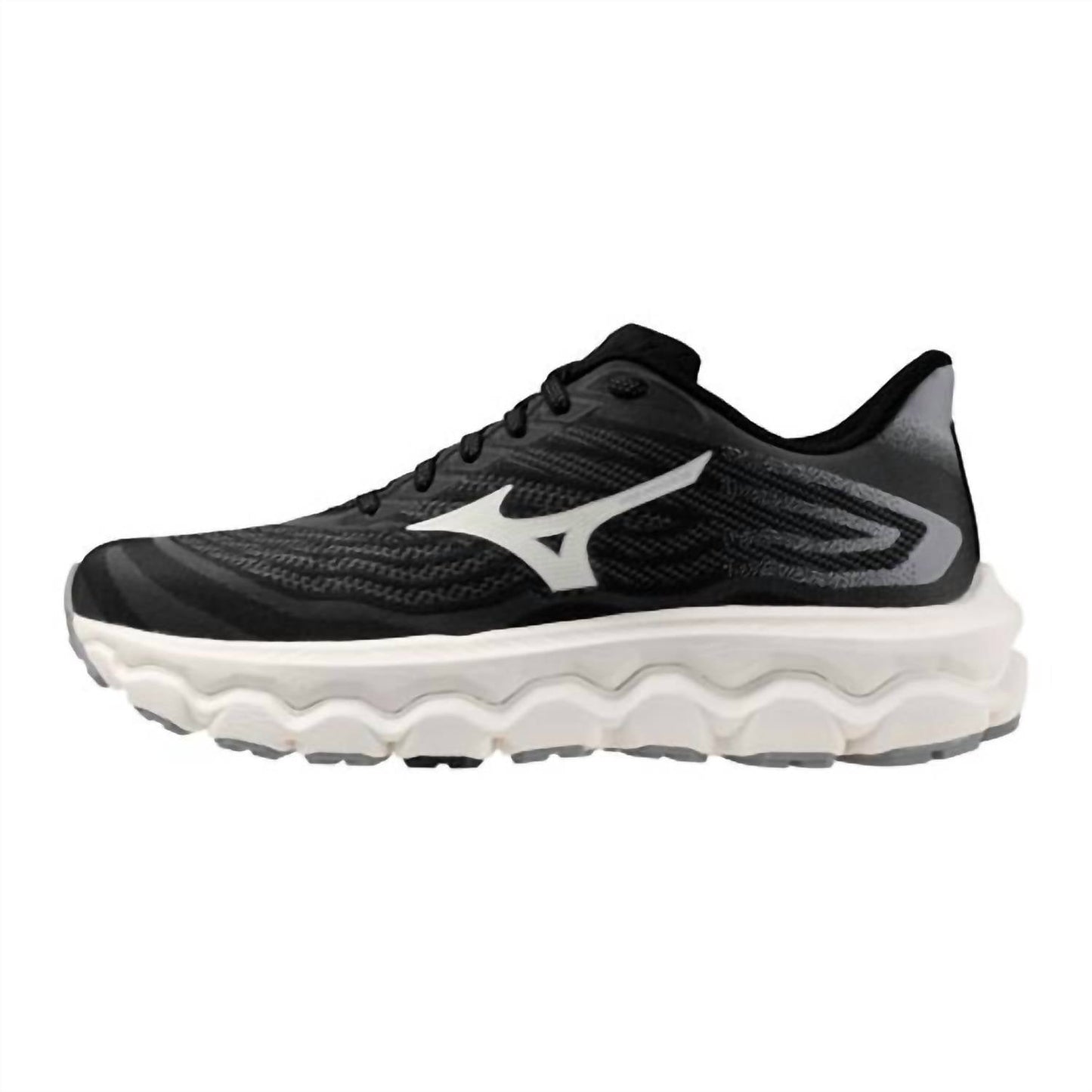Tenis para correr de mujer color negro y blanco