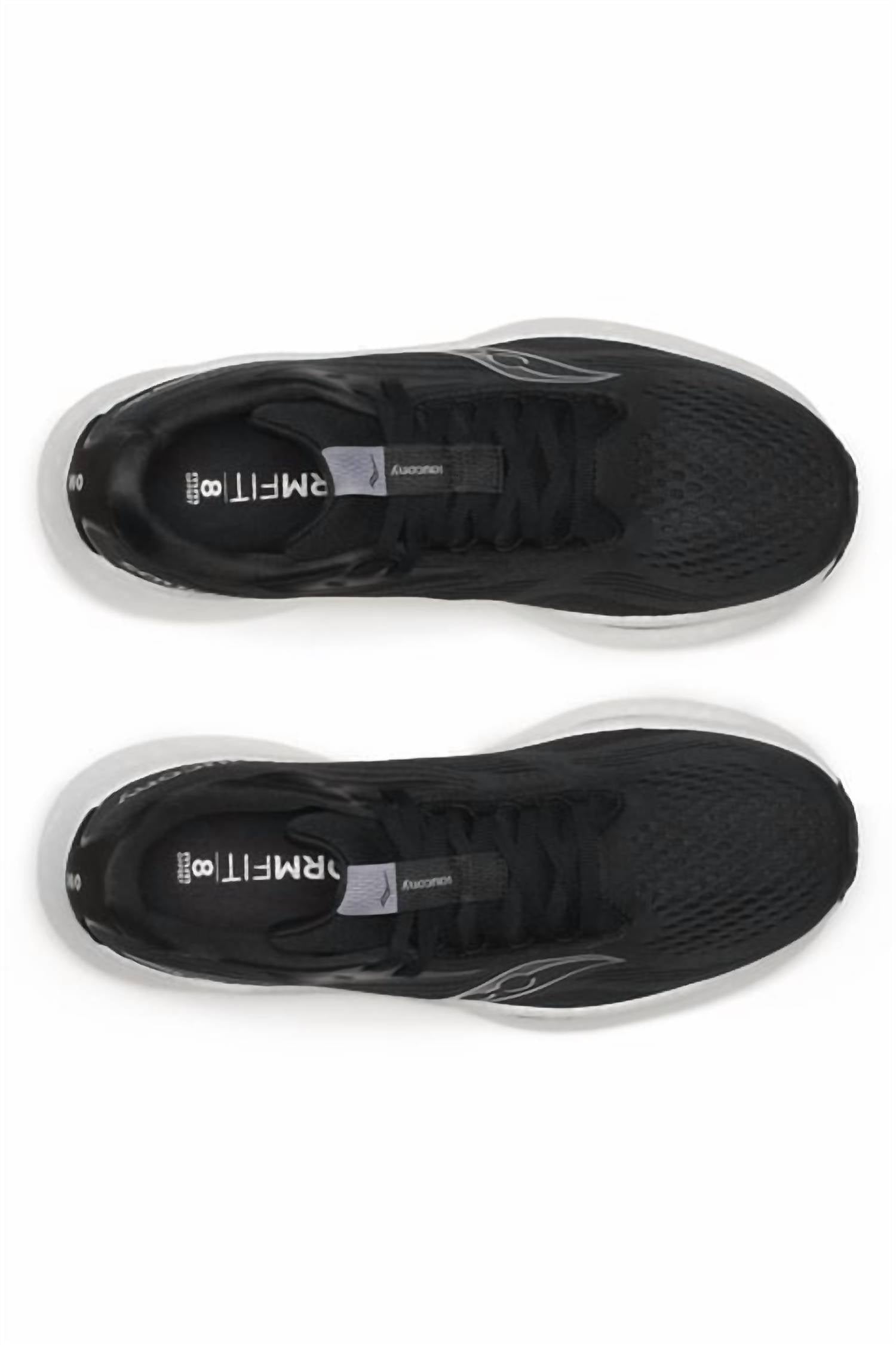 Tenis para correr de mujer color negro y blanco