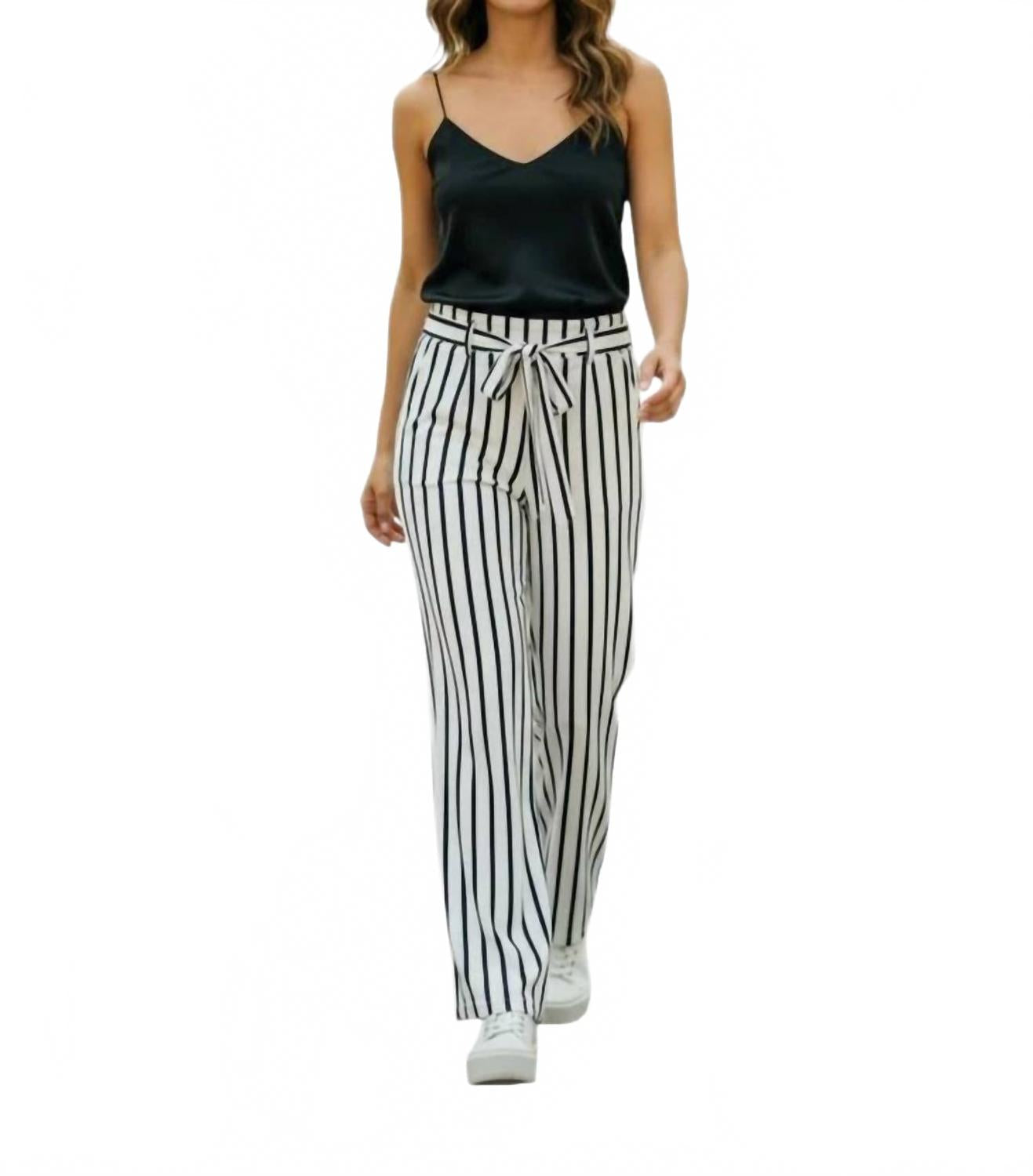 Pantalón de pierna ancha a rayas color blanco y azul