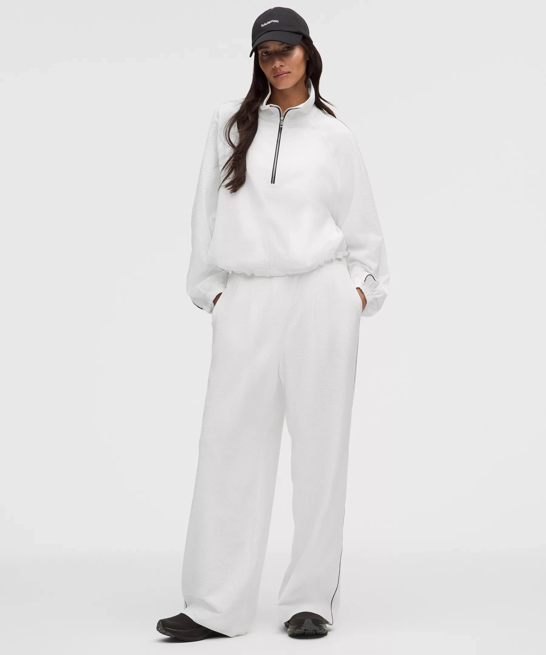 Pantalón de tiro alto con pliegues