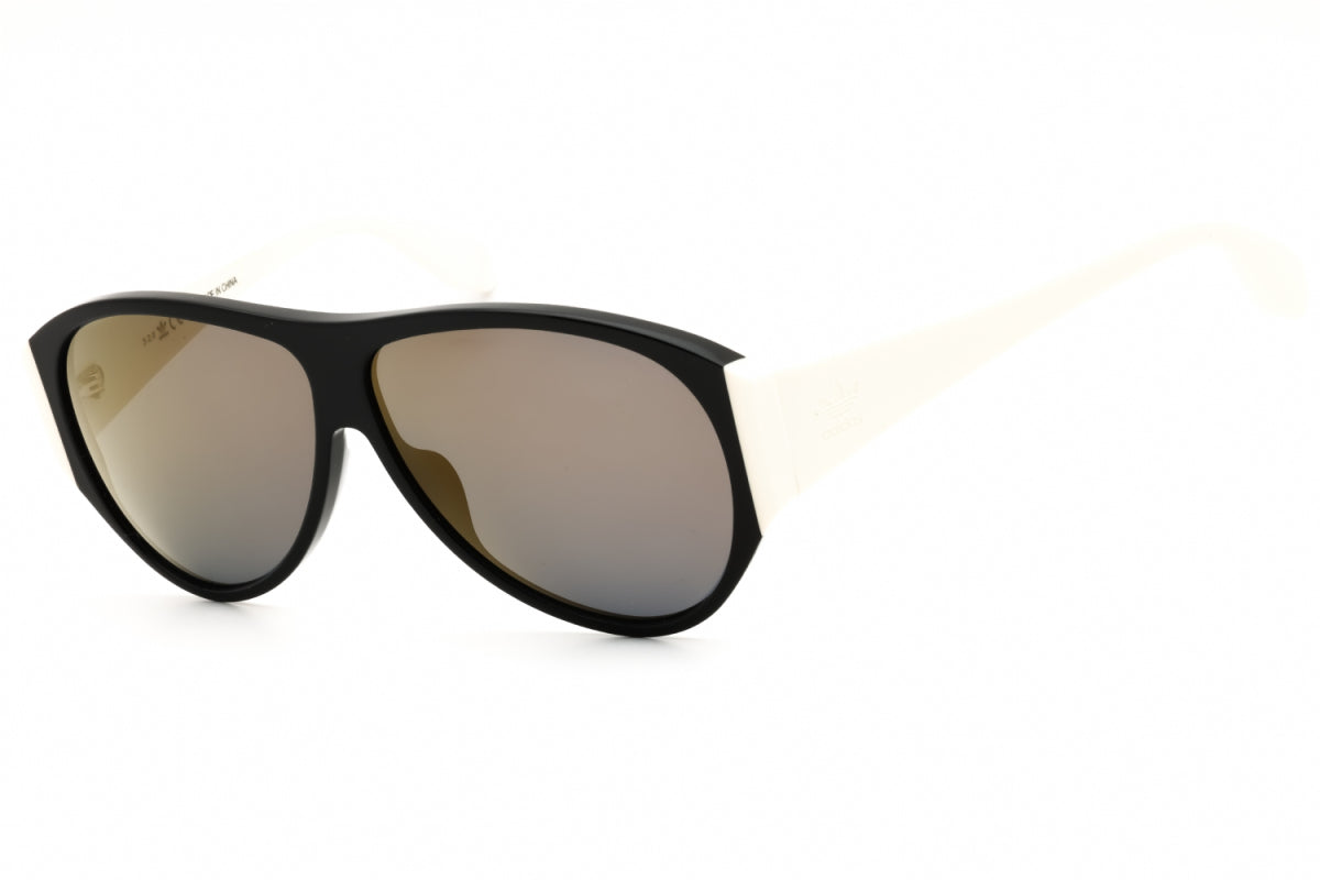 Gafas color negro y blanco y café
