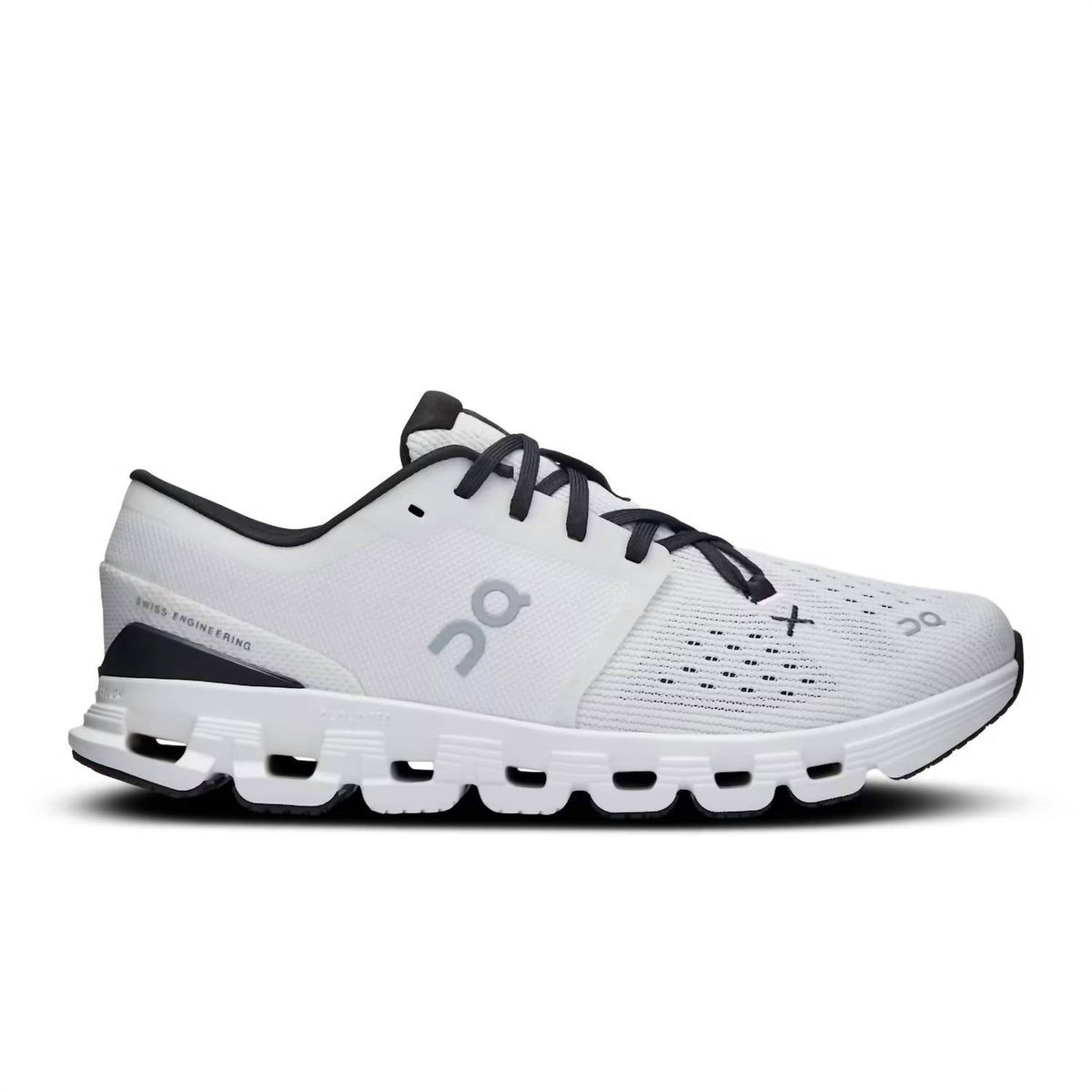 Tenis para correr de mujer color negro y marfil