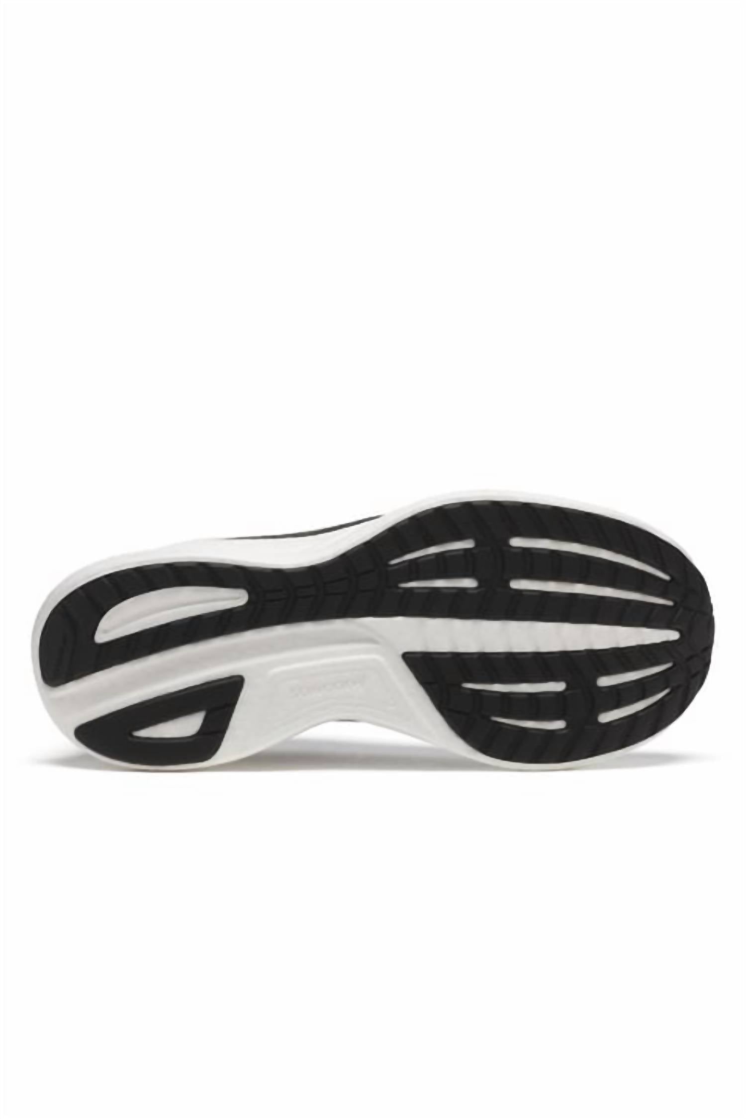 Tenis para correr de mujer color negro y blanco