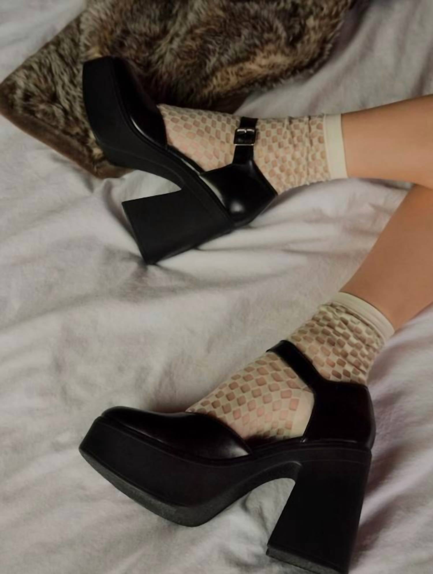 Tacones de mujer con plataforma color negro