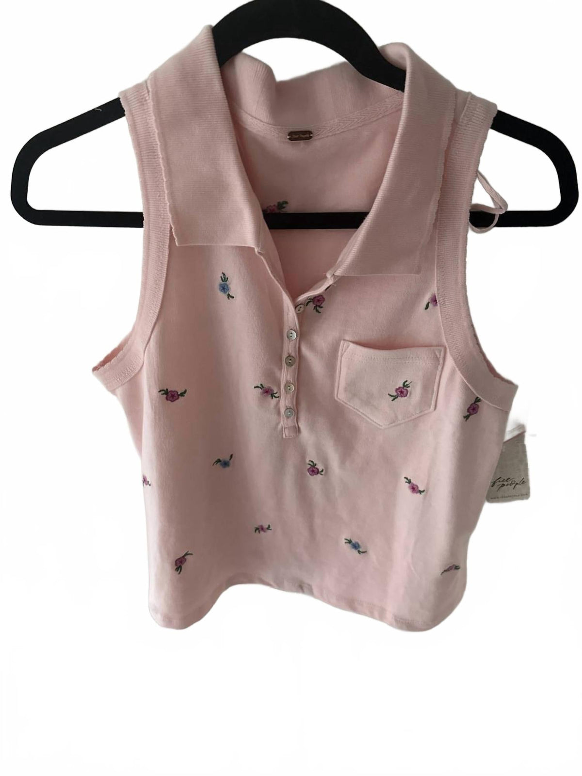 Polo de mujer con estampado floral color rosado
