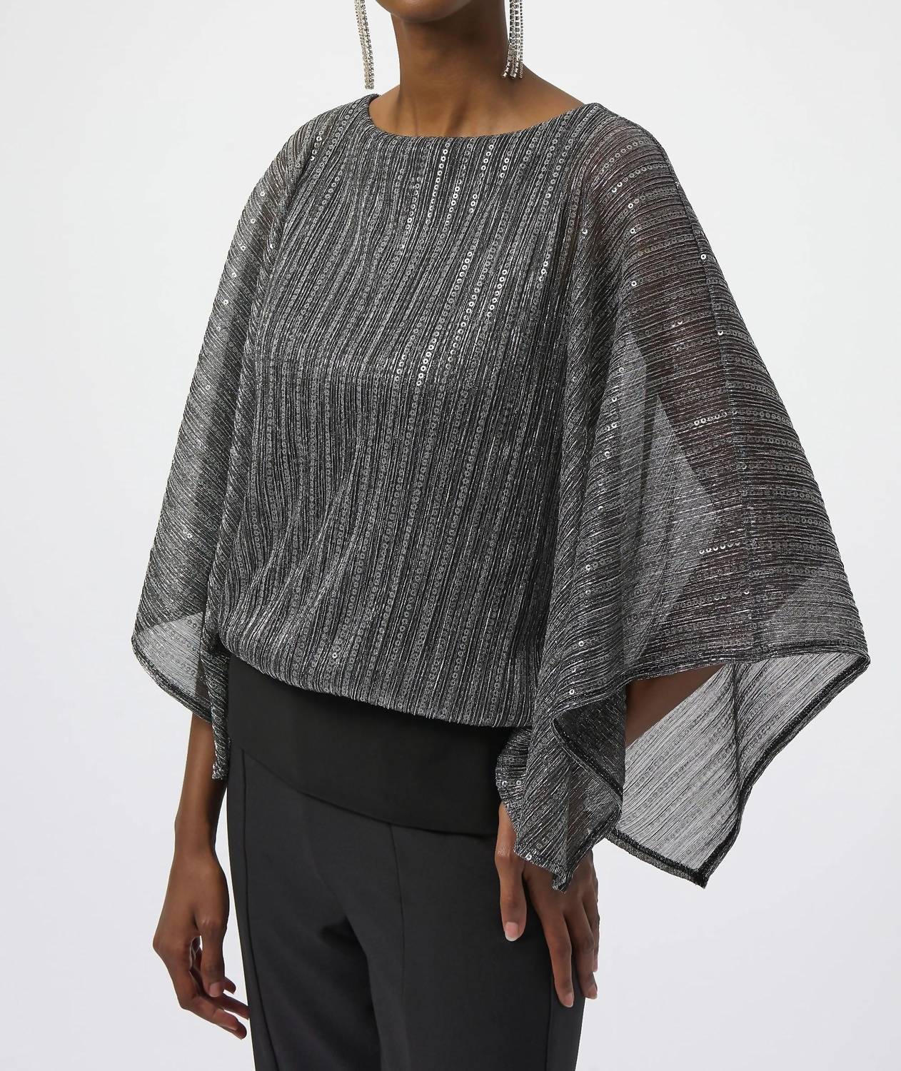 Top con lentejuelas color negro y plateado