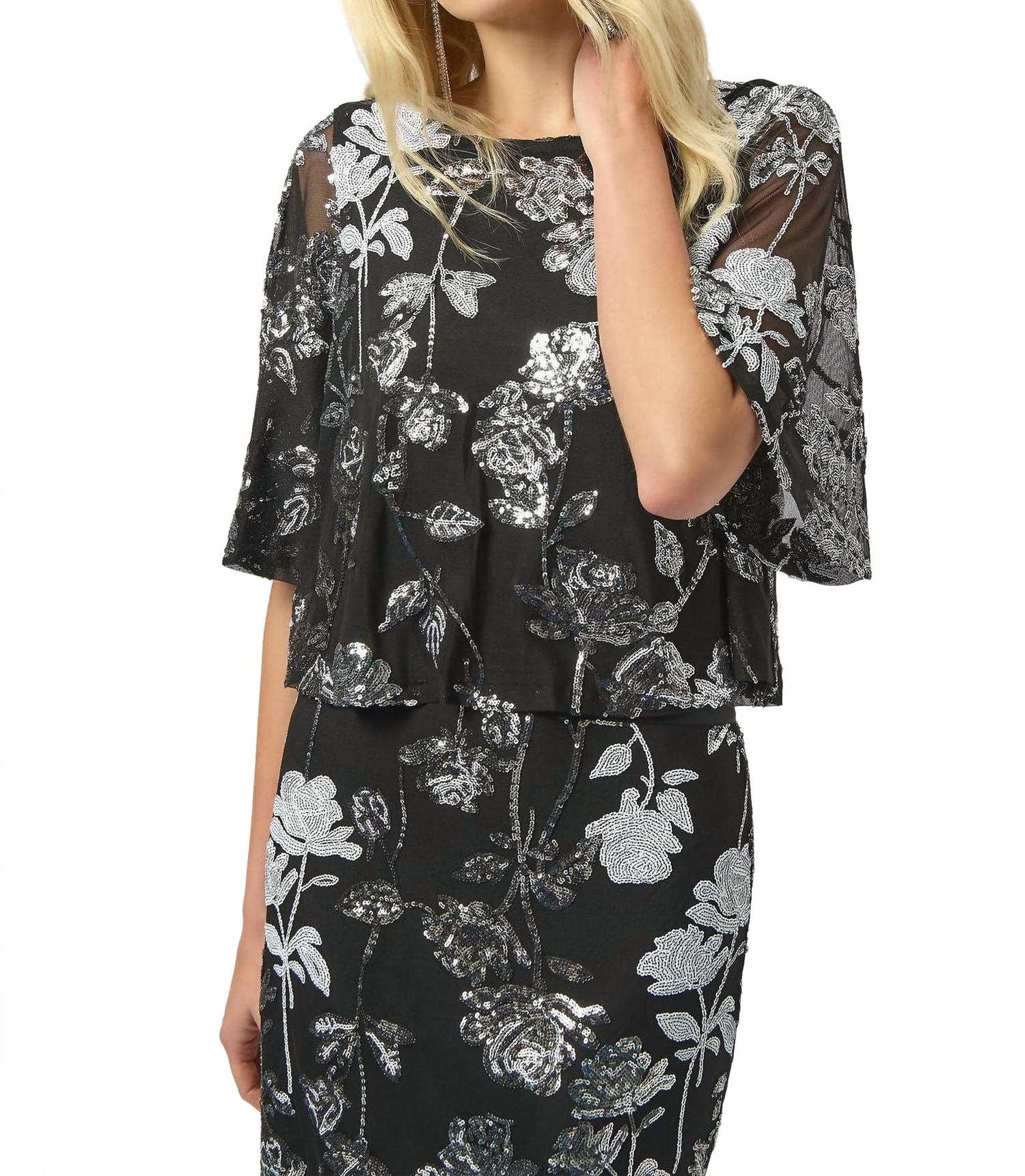 Top con estampado floral con lentejuelas color negro