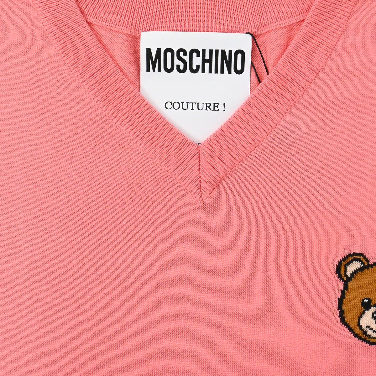 Suéter de algodón con cuello en V color rosado