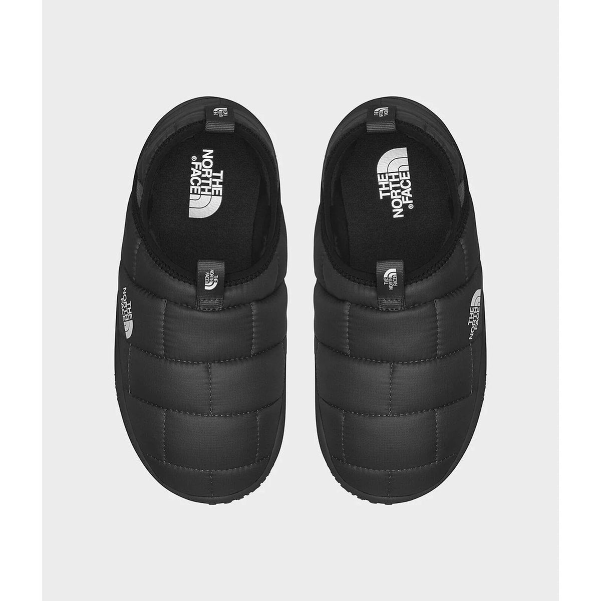 Pantuflas color negro y blanco