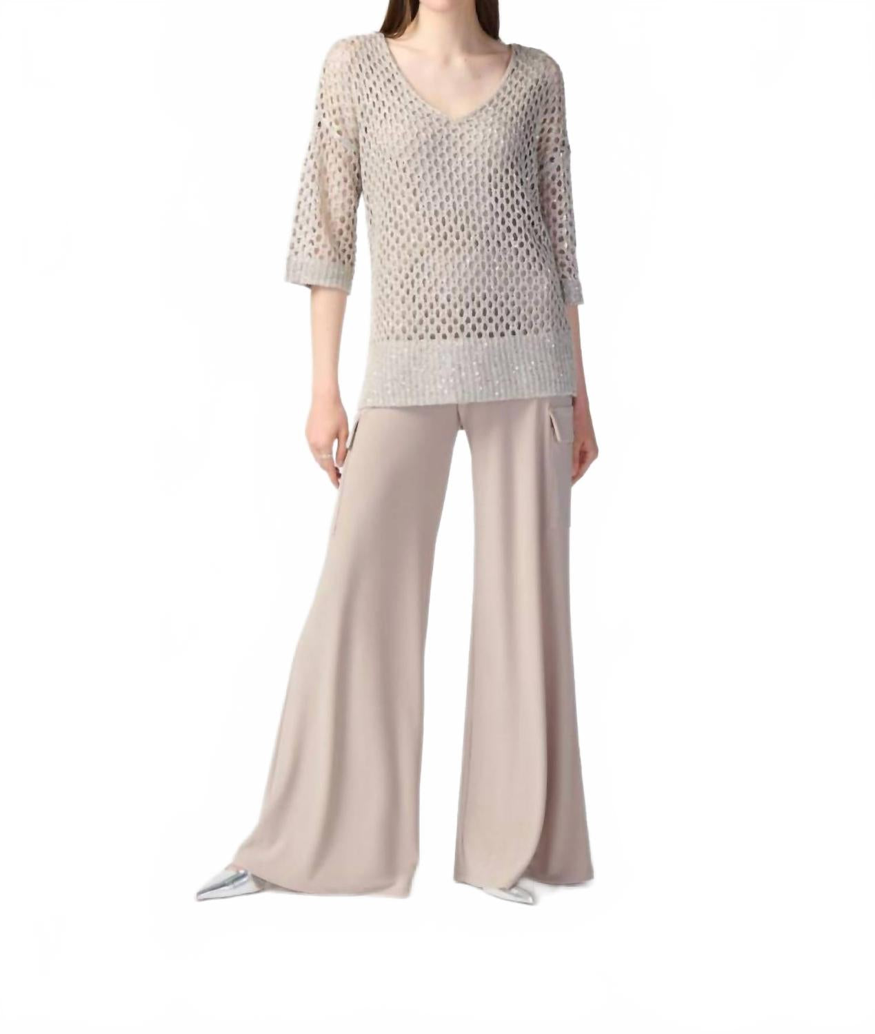Top con cuello en V con lentejuelas