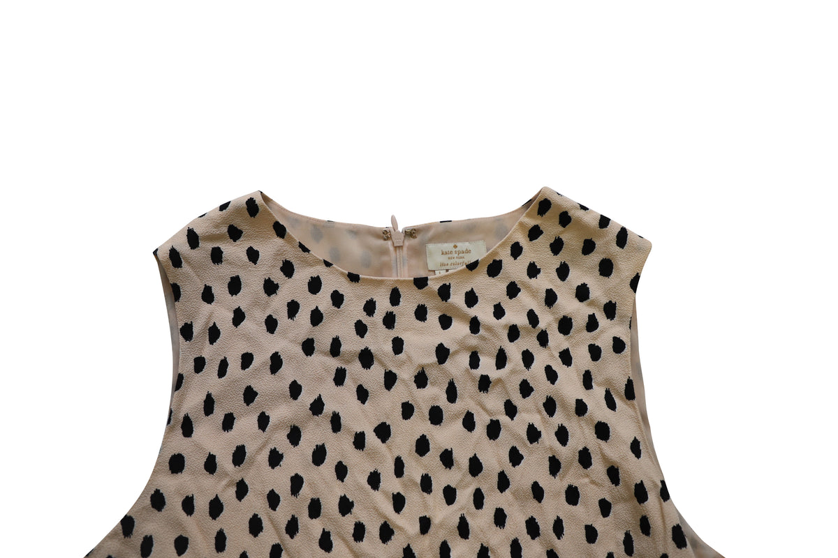 Top sin mangas color crema