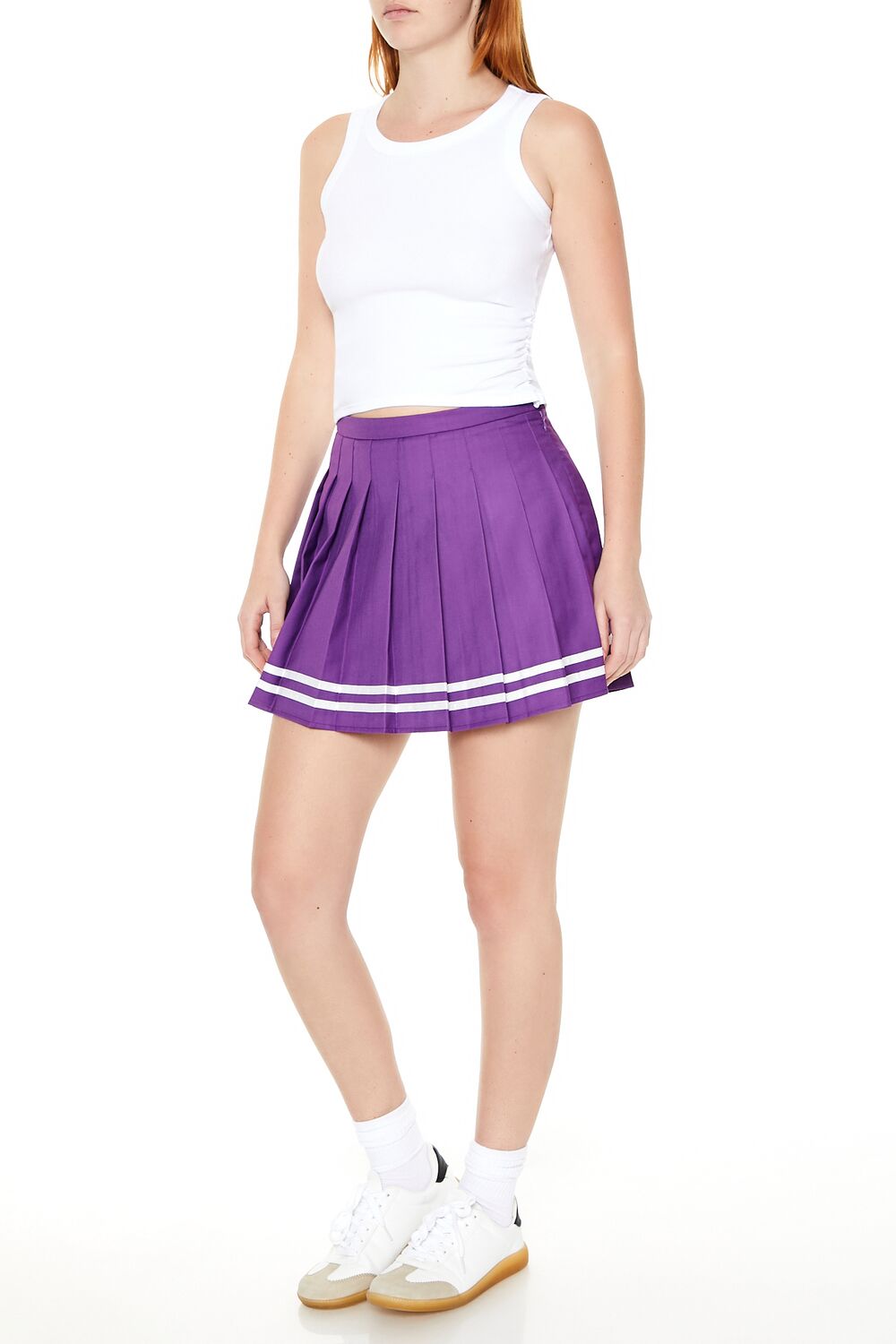 Falda corta a rayas con pliegues