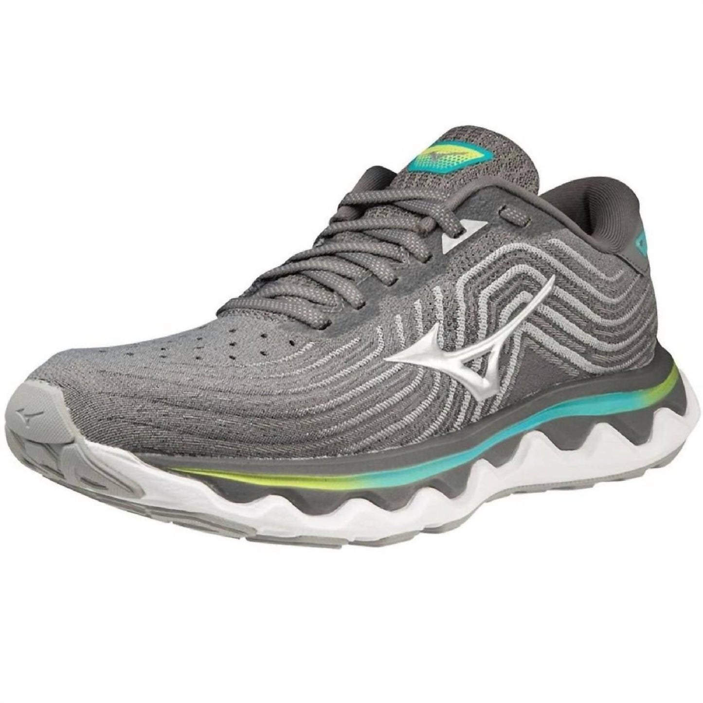 Tenis para correr de mujer color gris y plateado