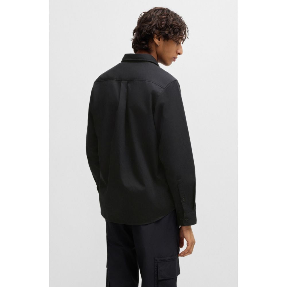 Camisa de corte amplio