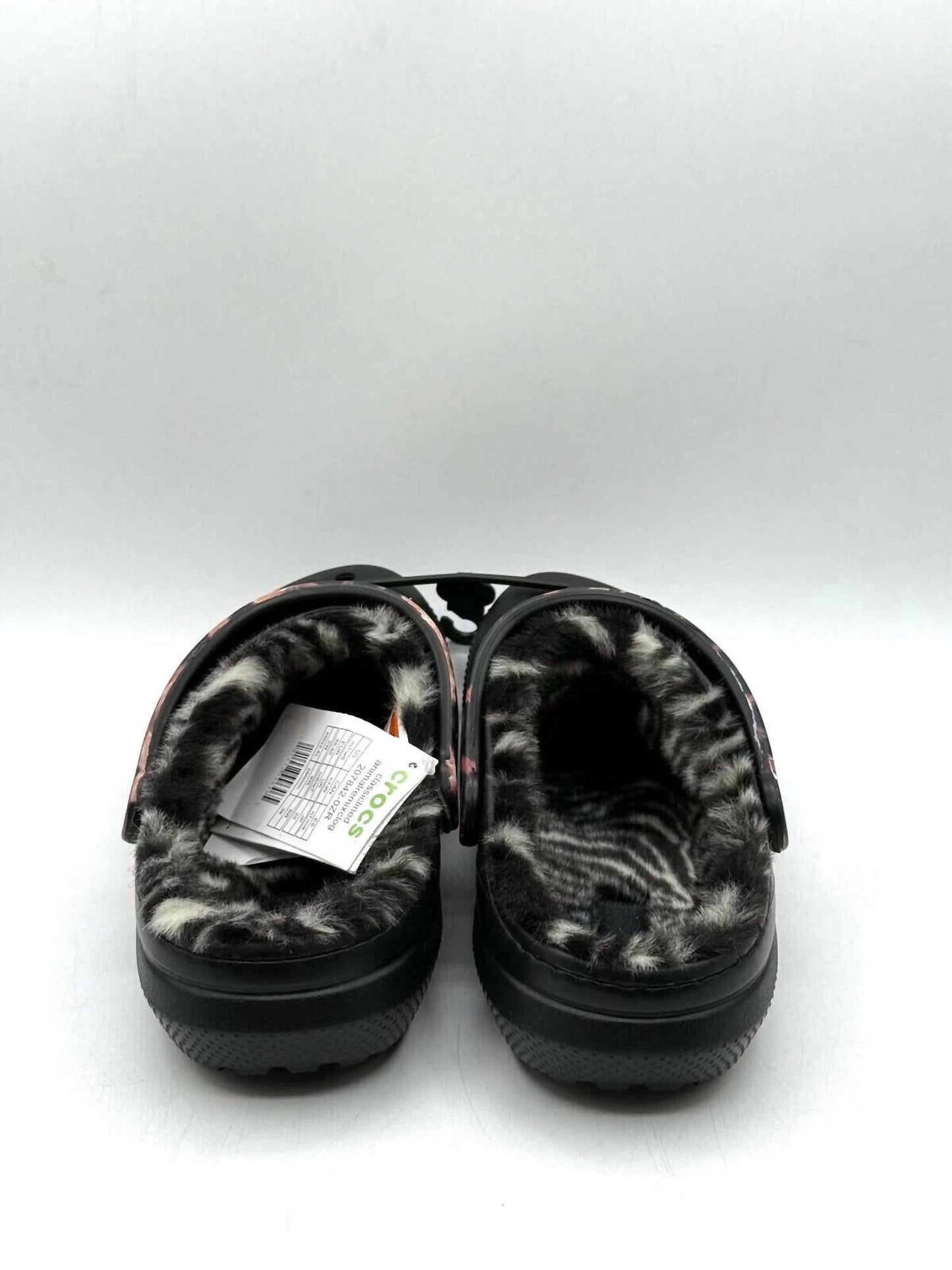 Zuecos de mujer con estampado animal color negro