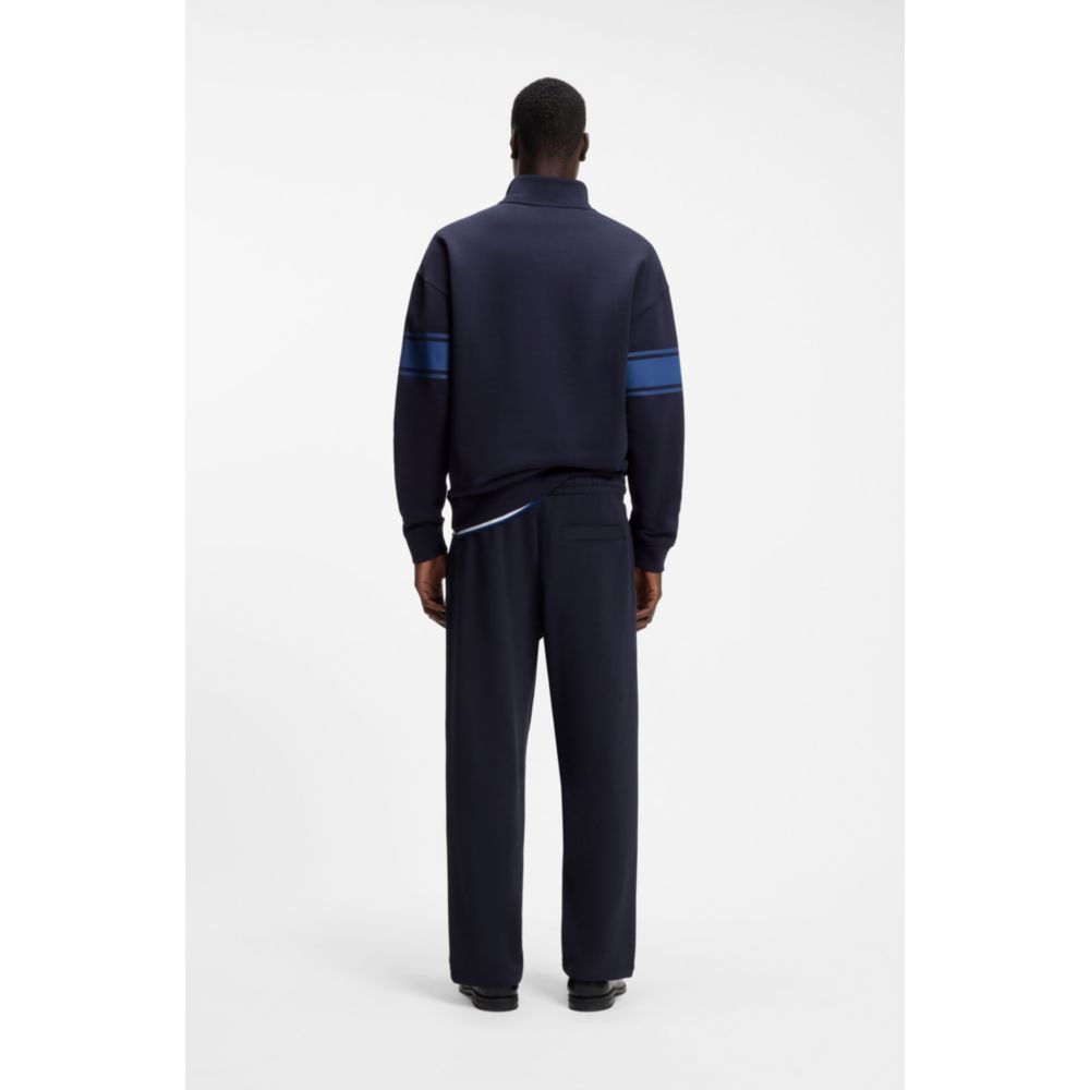 Pantalón deportivo de algodón de corte amplio a rayas