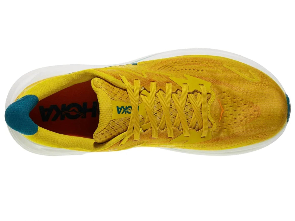 Tenis para correr de hombre color amarillo y dorado