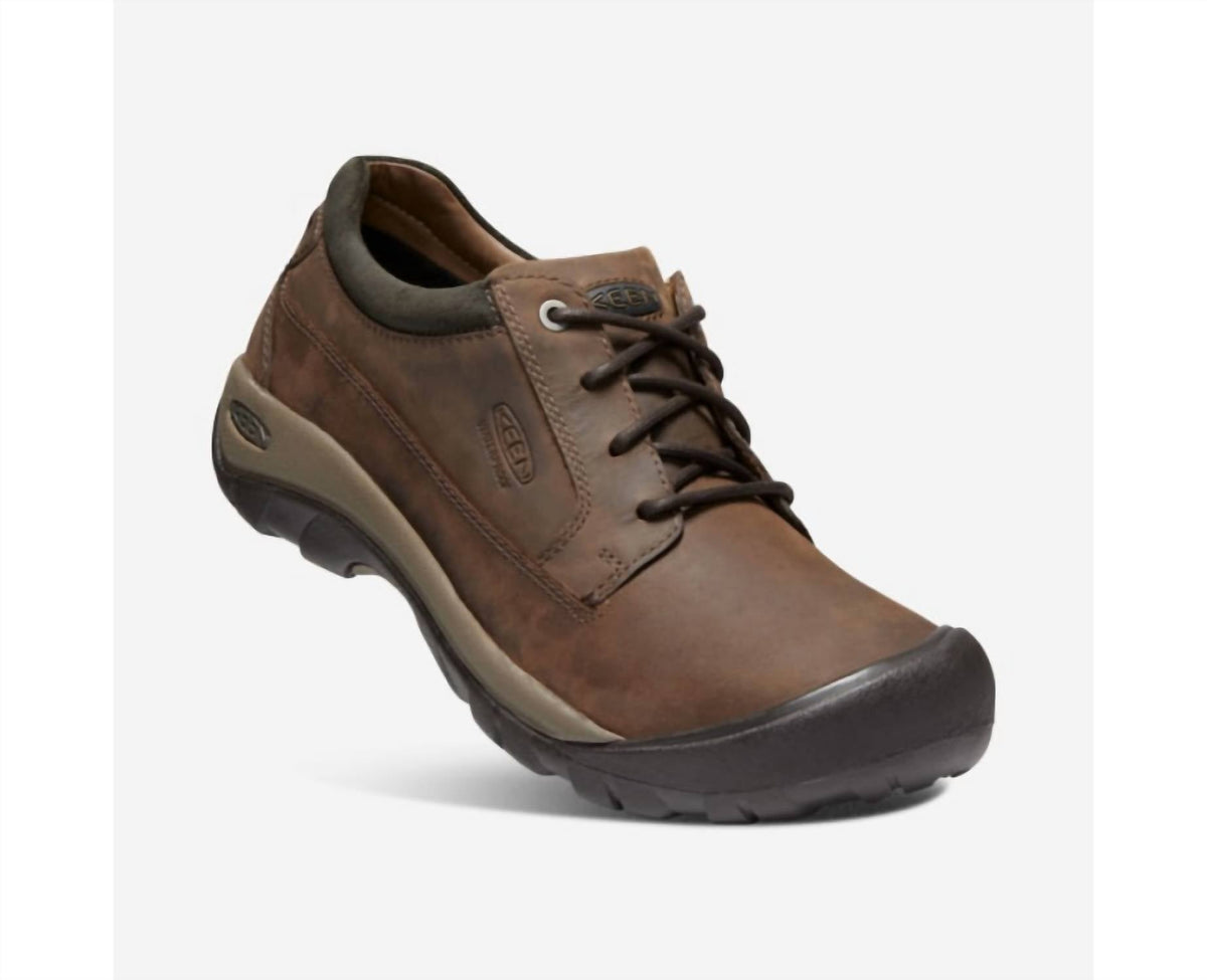 Zapatos de hombre impermeables color negro y café
