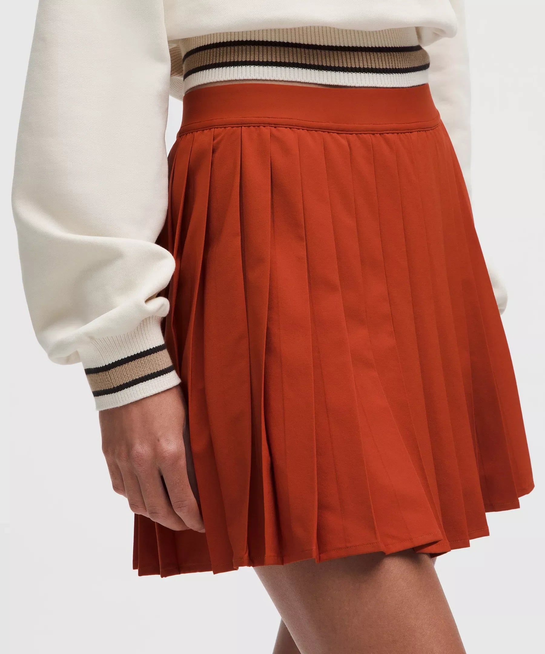 Falda de tiro alto con pliegues