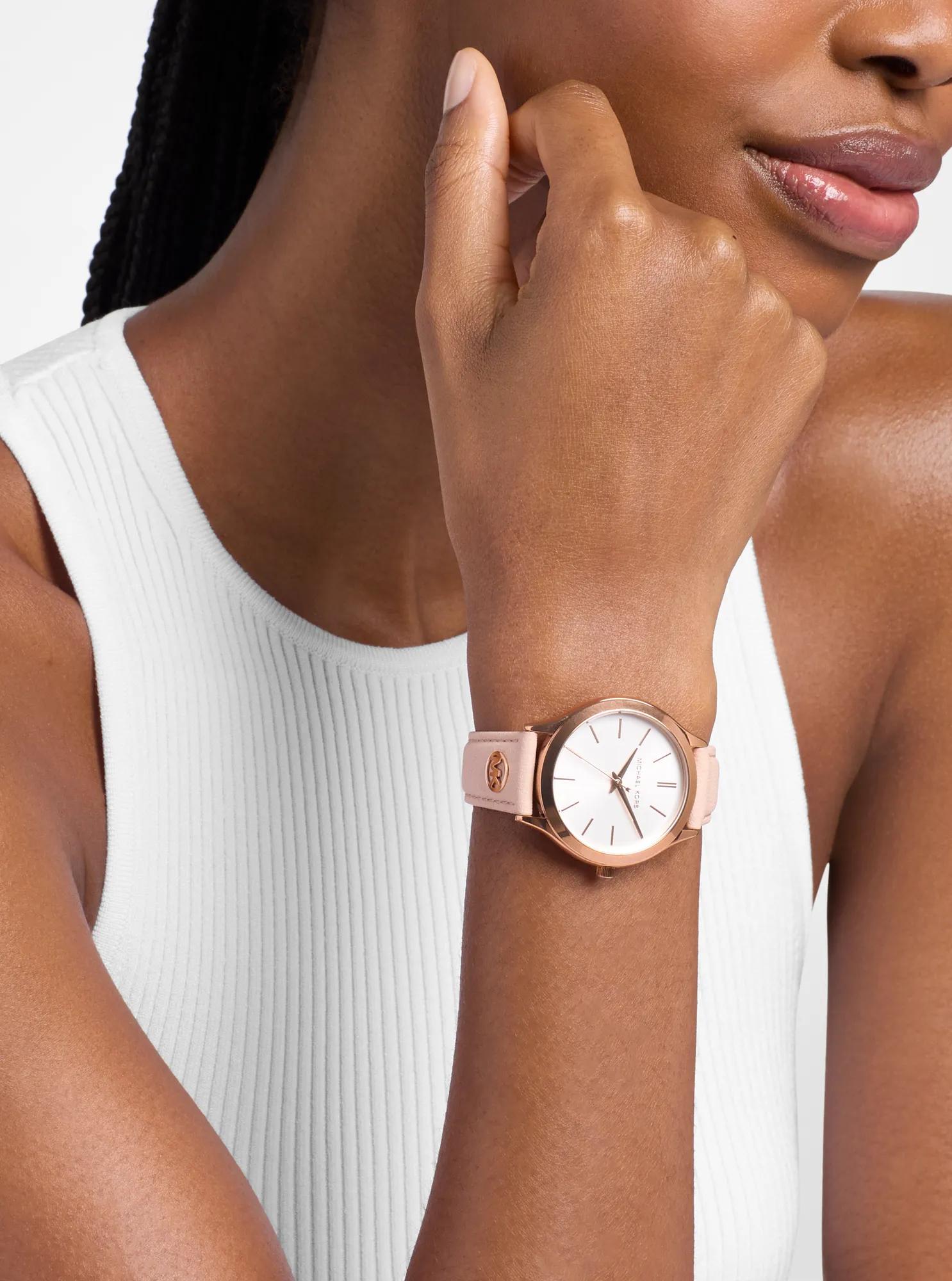 Reloj de cuero color oro rosa