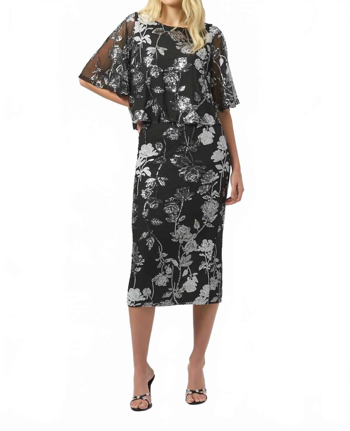 Top con estampado floral con lentejuelas color negro