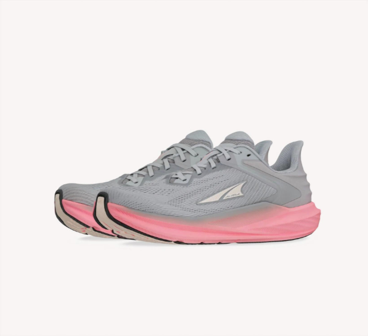 Tenis para correr de mujer color gris y rosado
