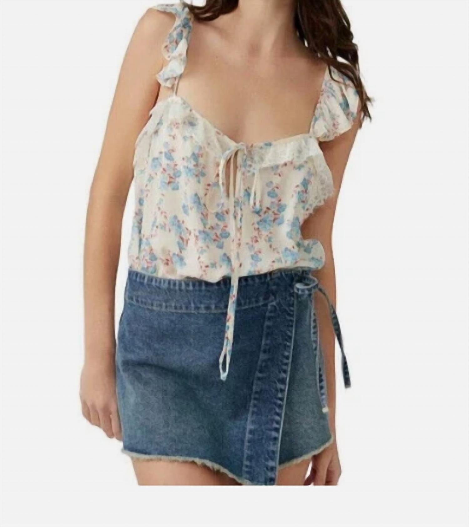 Body con estampado floral color azul y marfil