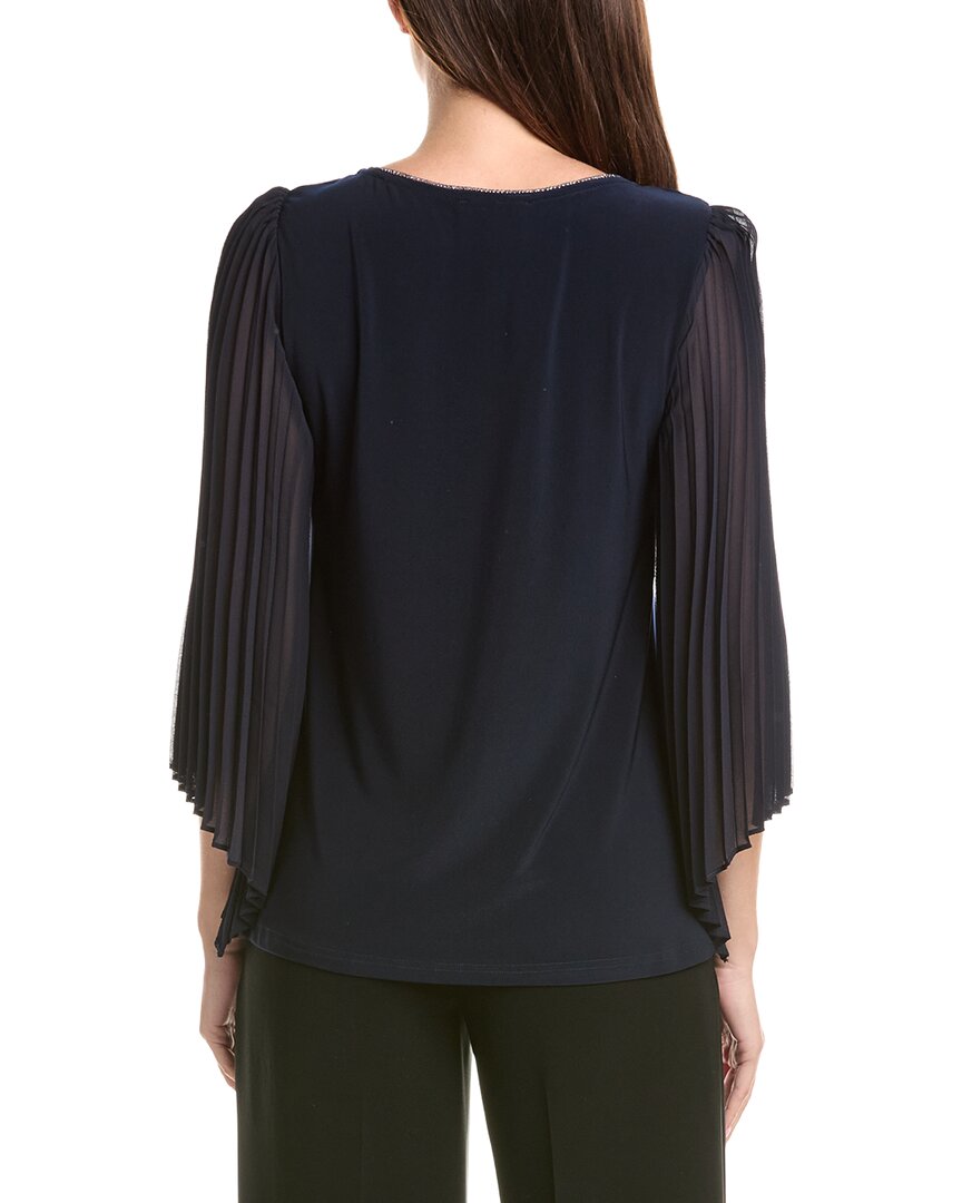 Top con pliegues