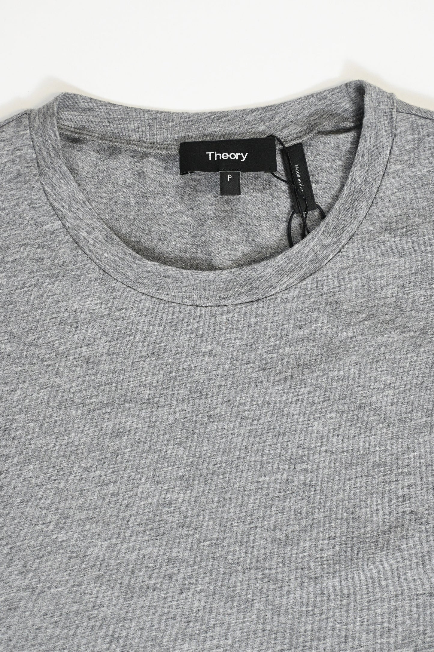 Top de algodón de manga larga con cuello redondo color gris