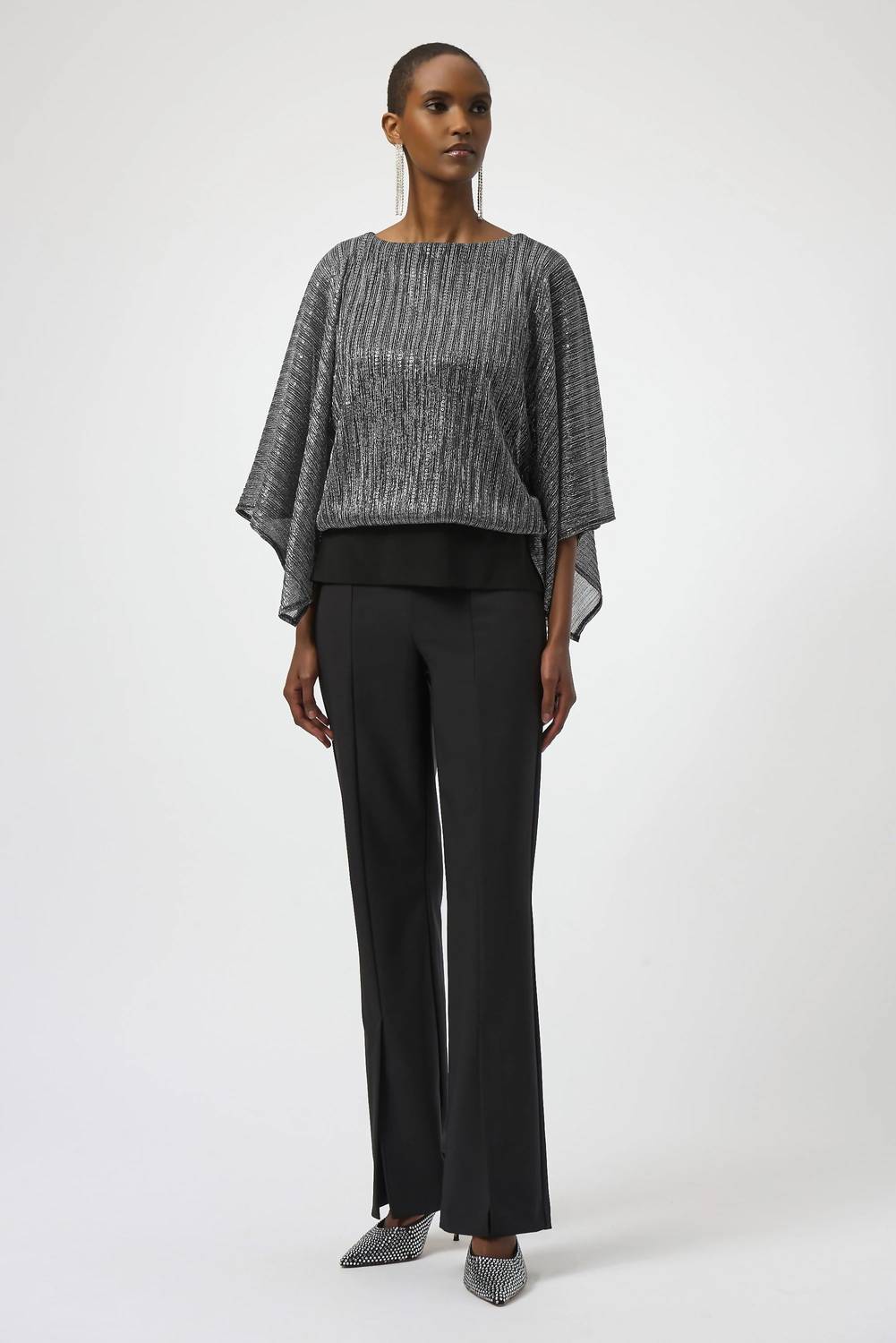 Top con lentejuelas color negro y plateado