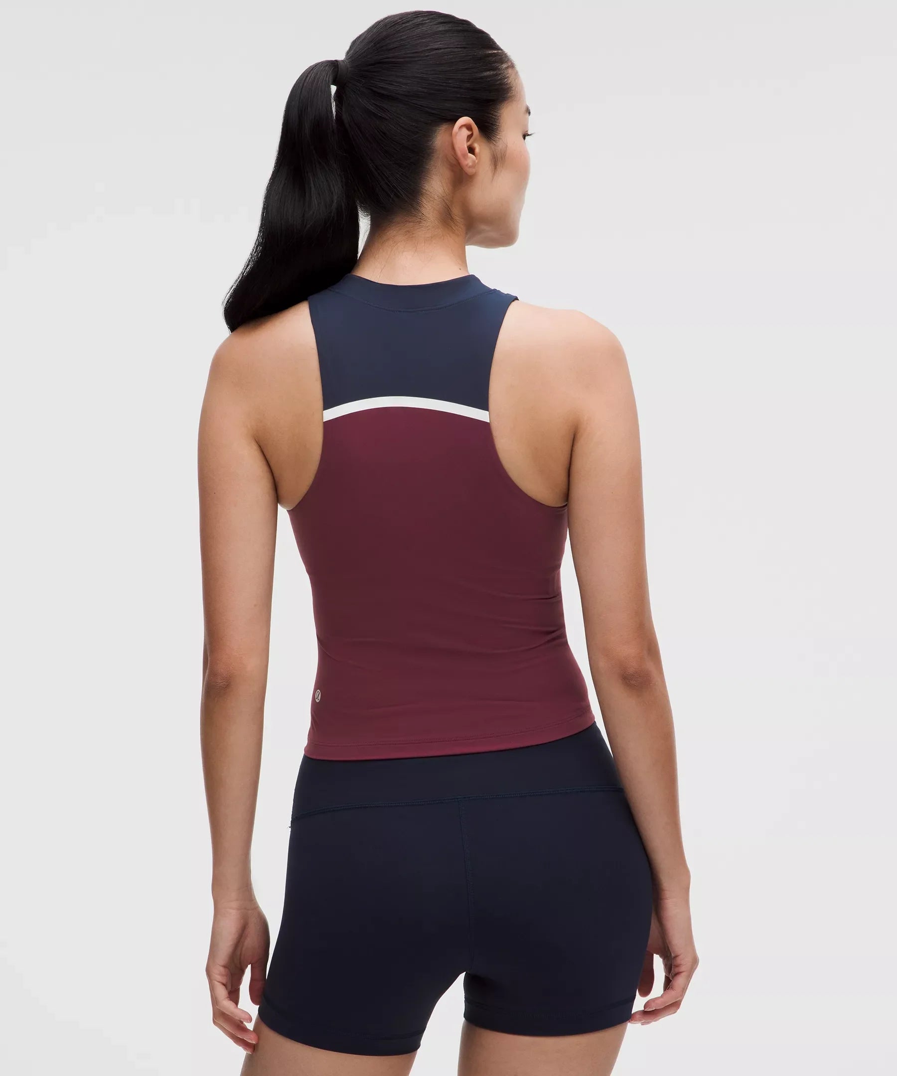 Camiseta sin mangas con cuello alto