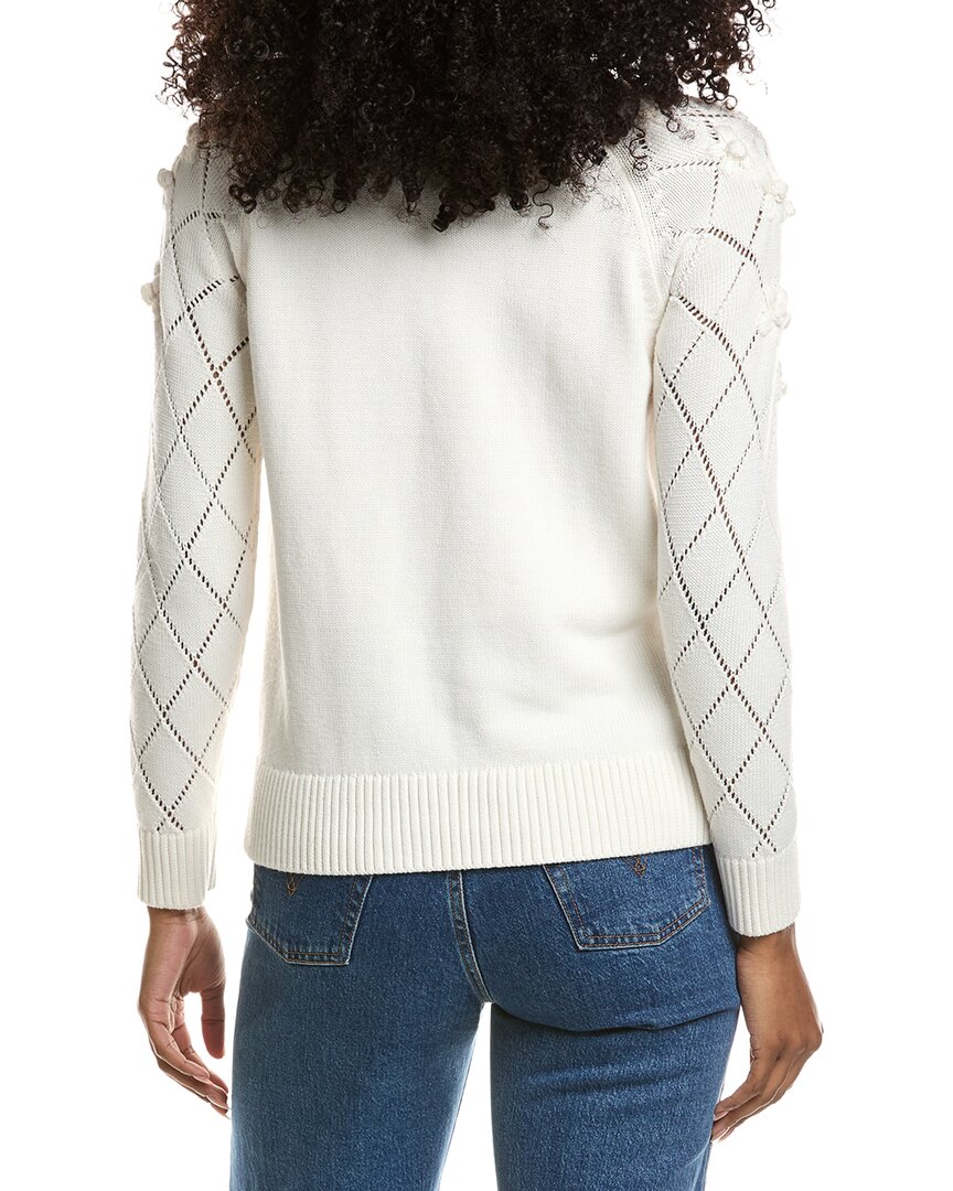 Suéter con estampado floral con tejido calado