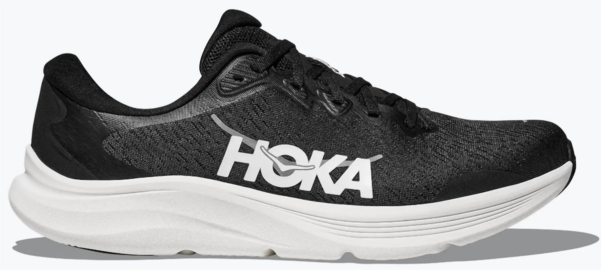 Tenis para correr de mujer color negro y blanco