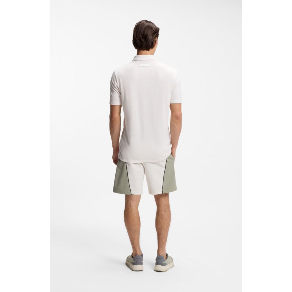 Polo de corte ajustado