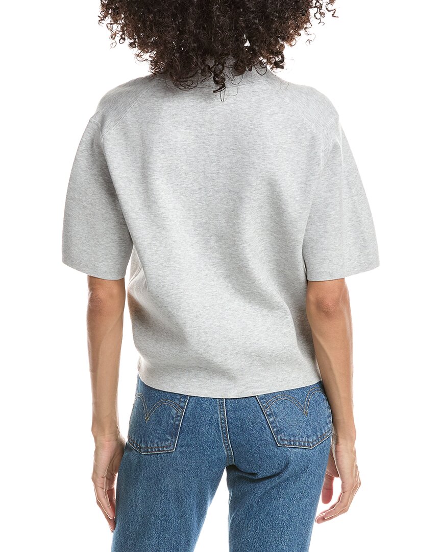 Polo de corte amplio