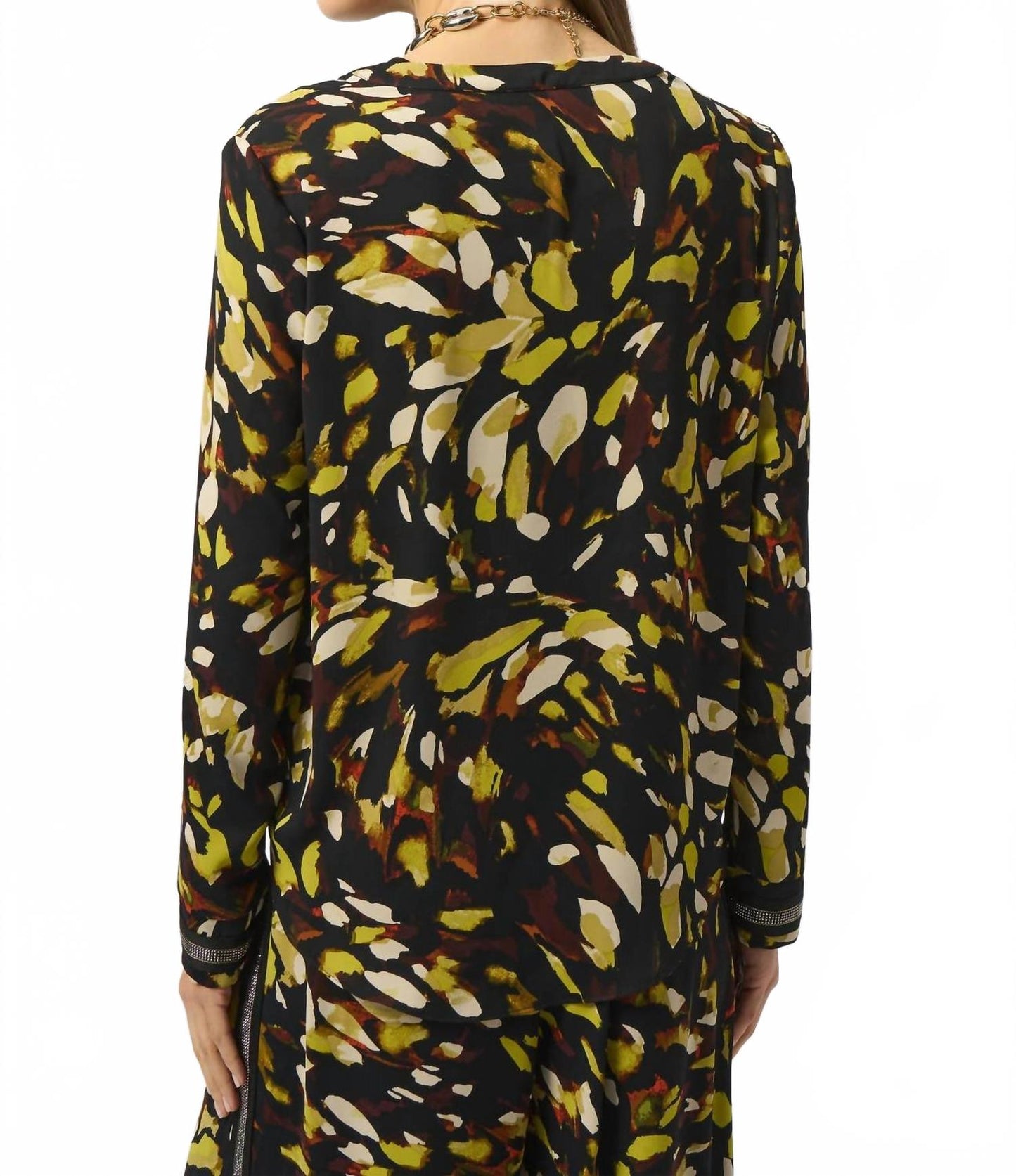 Top de manga larga con estampado animal color negro