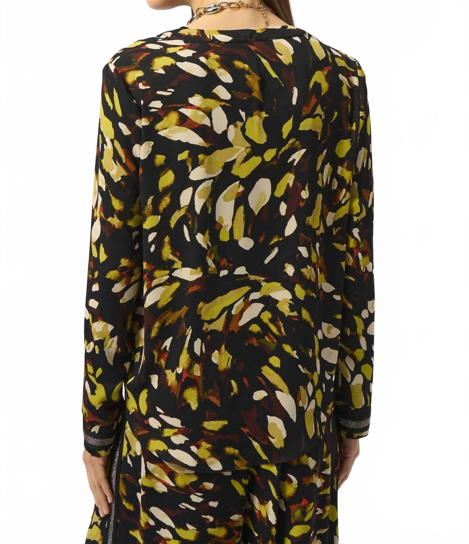 Top de manga larga con estampado animal color negro
