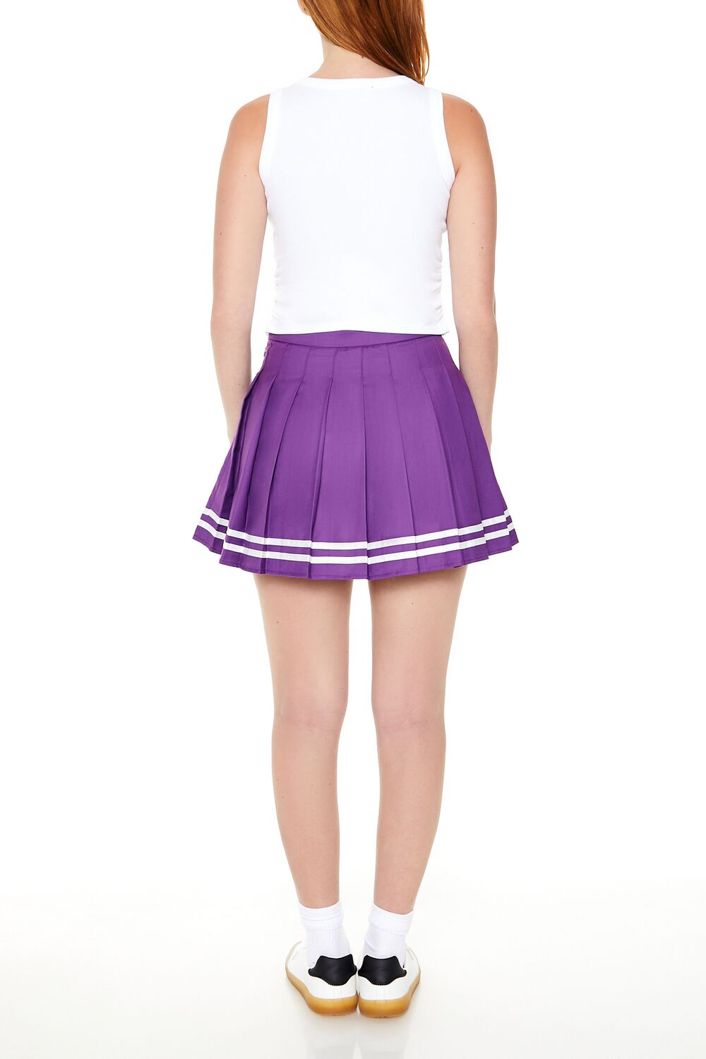 Falda corta a rayas con pliegues