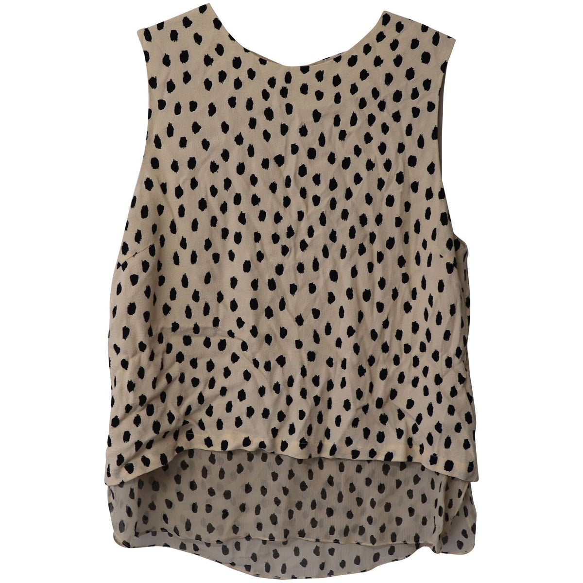 Top sin mangas color crema