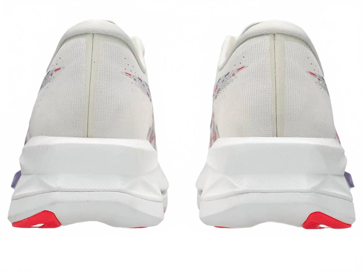 Tenis para correr de mujer color azul y crema