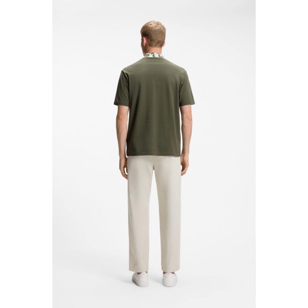 Polo de corte amplio
