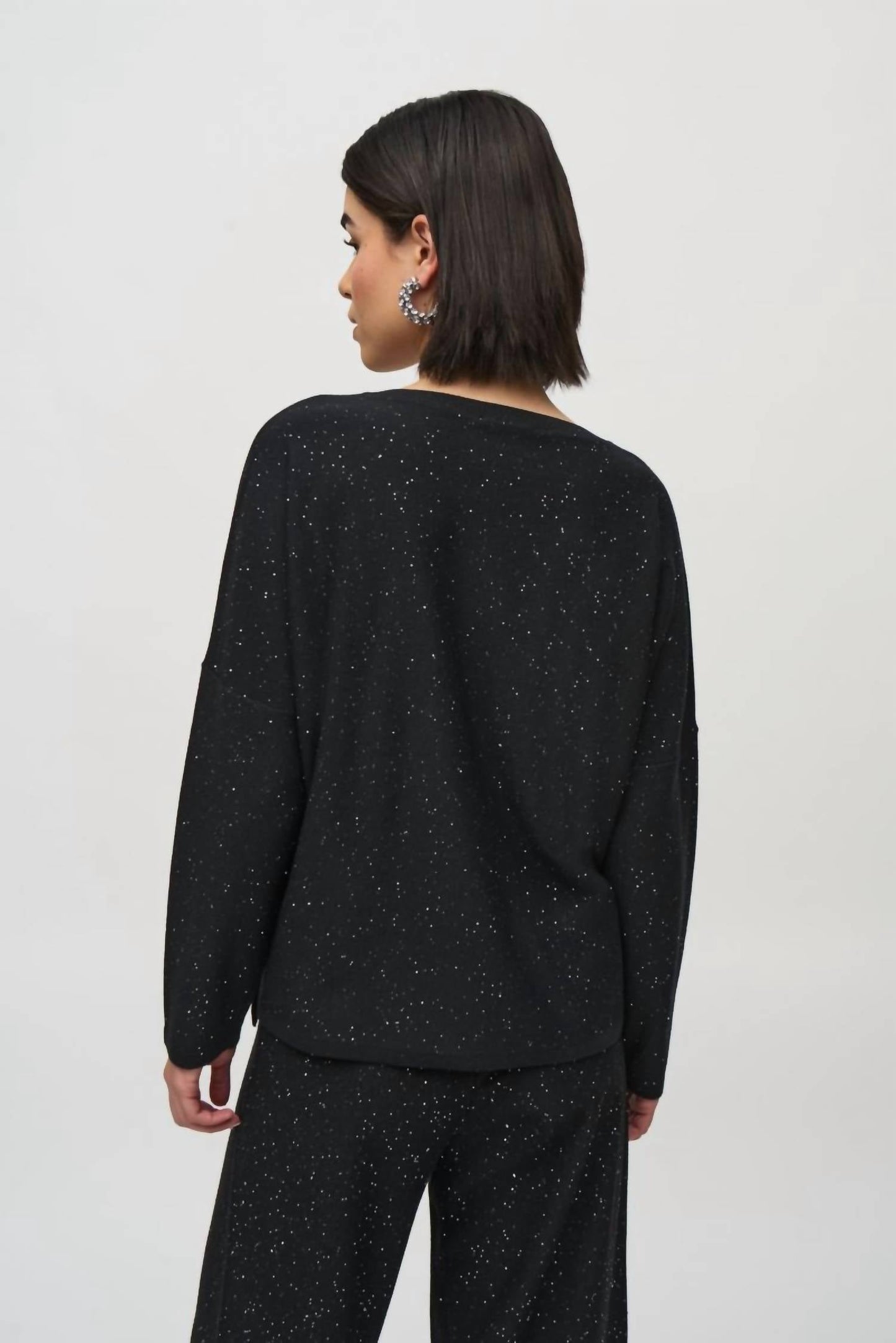Top de mujer de manga larga con lentejuelas color negro