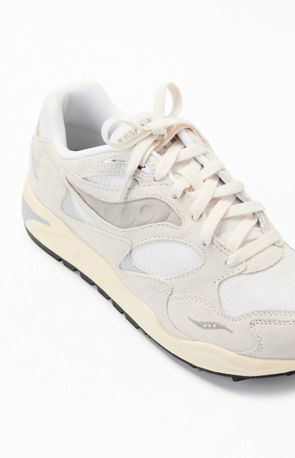 Tenis unisex color blanco y crema